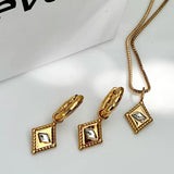 Ever Arena Huggie Earrings