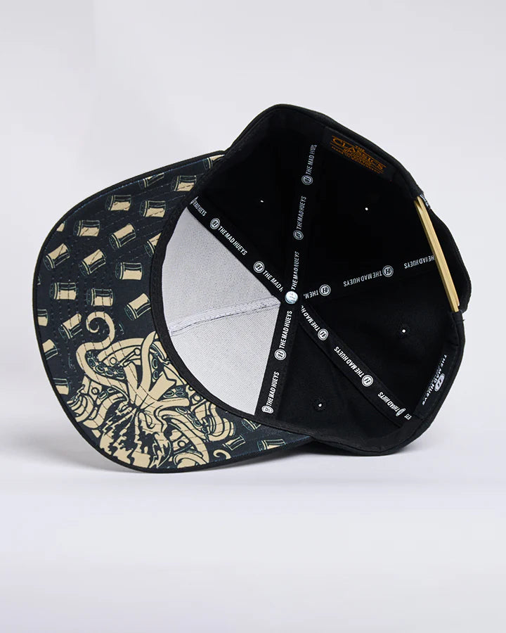 The Mad Hueys Kraken Port Hole Twill Snapback Cap